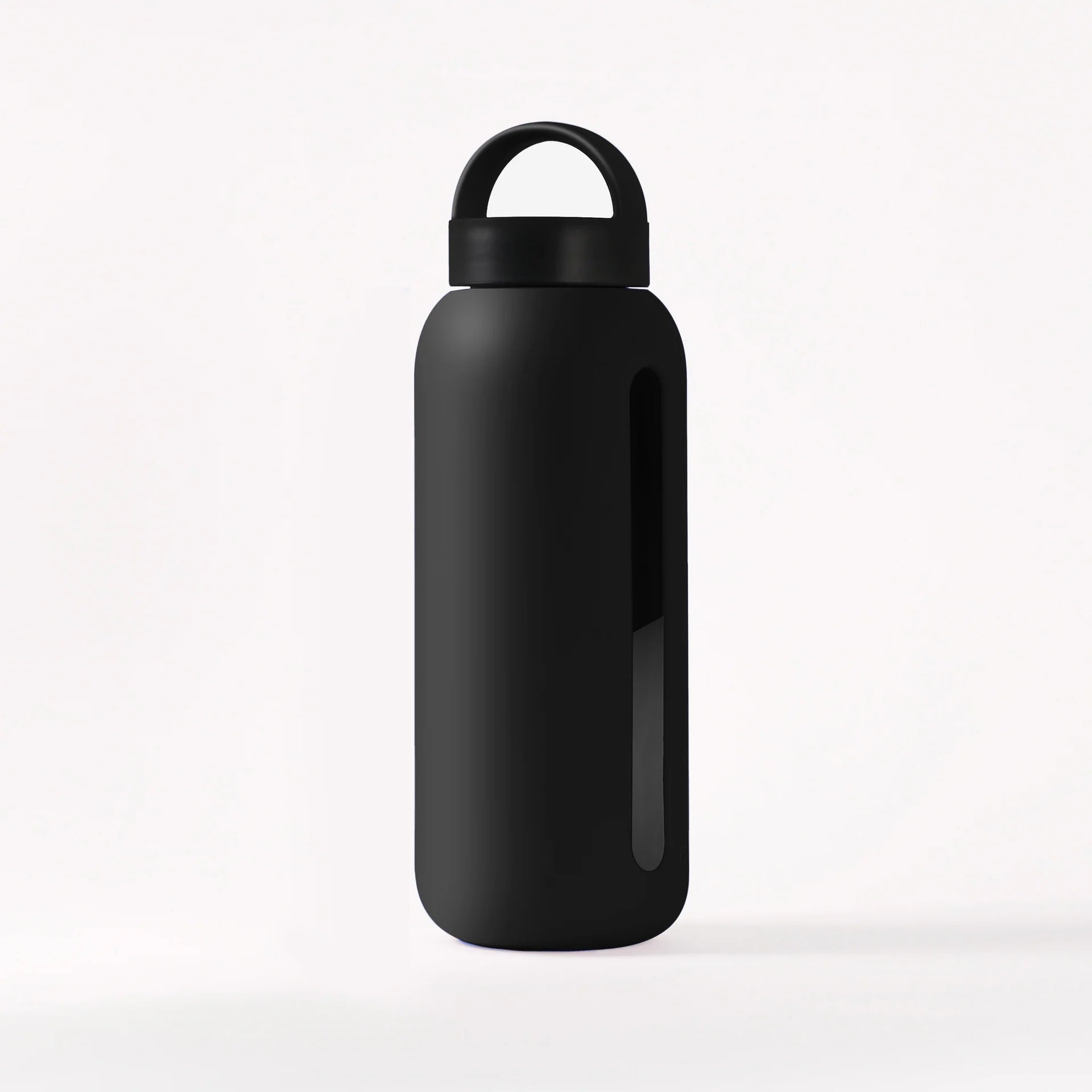 Glass water bottle with a protective silicone sleeve and screw on cap in black.