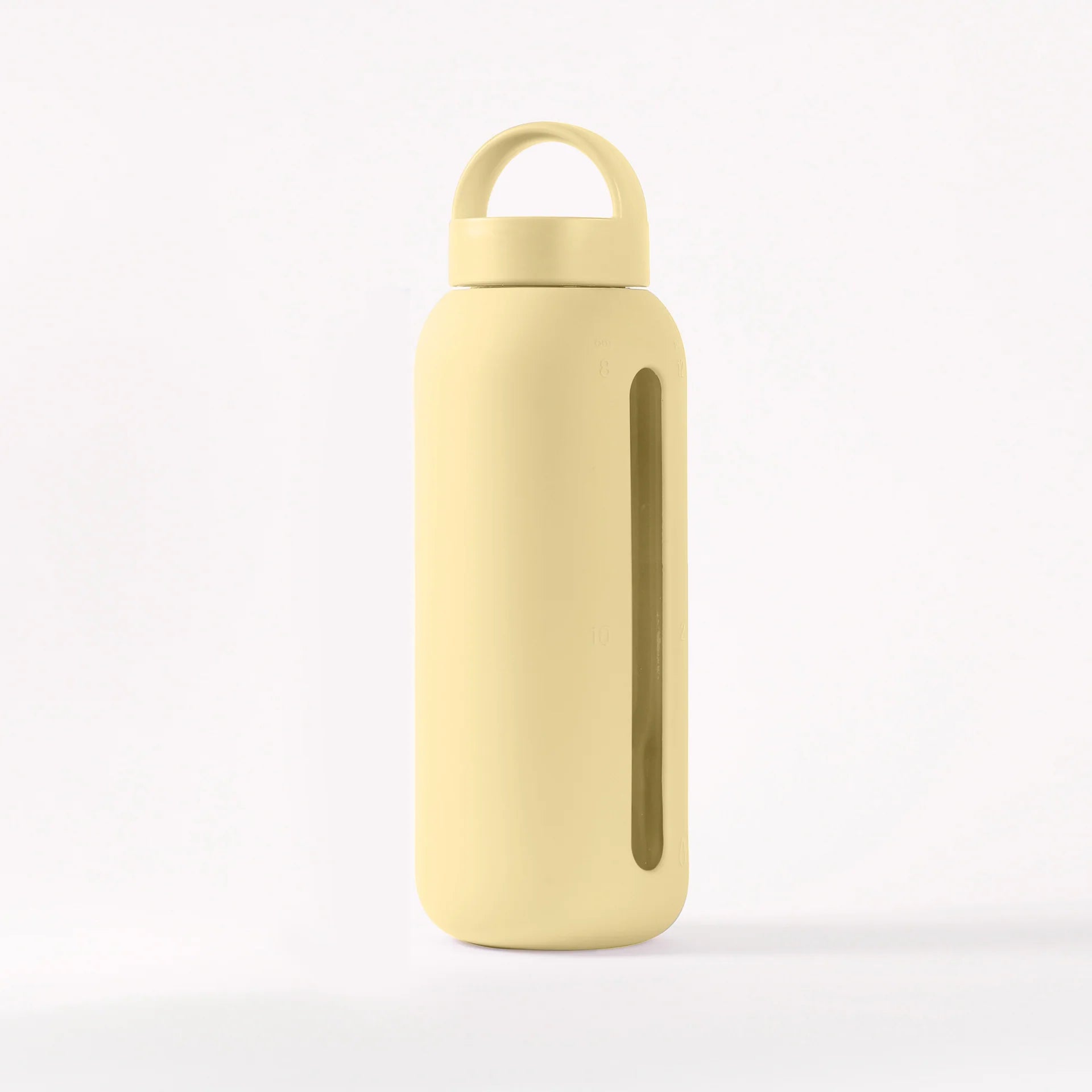 Glass water bottle with a protective silicone sleeve and screw on cap in yellow.