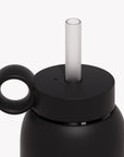 Silicone straw and screw on cap for Bink bottle in black.