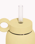 Silicone straw and screw on cap for Bink bottle in yellow.