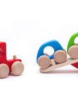 Wooden toy with colorful handles on a white background