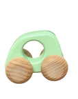 teal wooden car with four big wheels