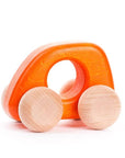 orange wooden car with four big wheels