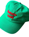 Green cap with red text 'tomato basil' on a white background