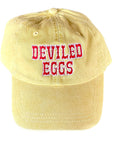 Yellow hat with DEVILED EGGS embroidered on front in red.