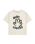 Beige t-shirt with colorful handprint design and 'BOBO CHOSES' text on a white background.