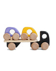 Wooden toy with colorful handles on a white background