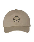 Tan baseball hat with black embroidered smiley face.