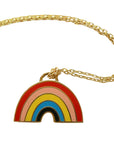 Gold chain necklace with a colorful rainbow pendant on a white background