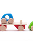 Wooden toy with colorful handles on a white background