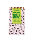 Pocket notebook with ant pattern and green label on a beige background