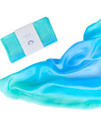 Turquoise silicone mold and packaging on a white background