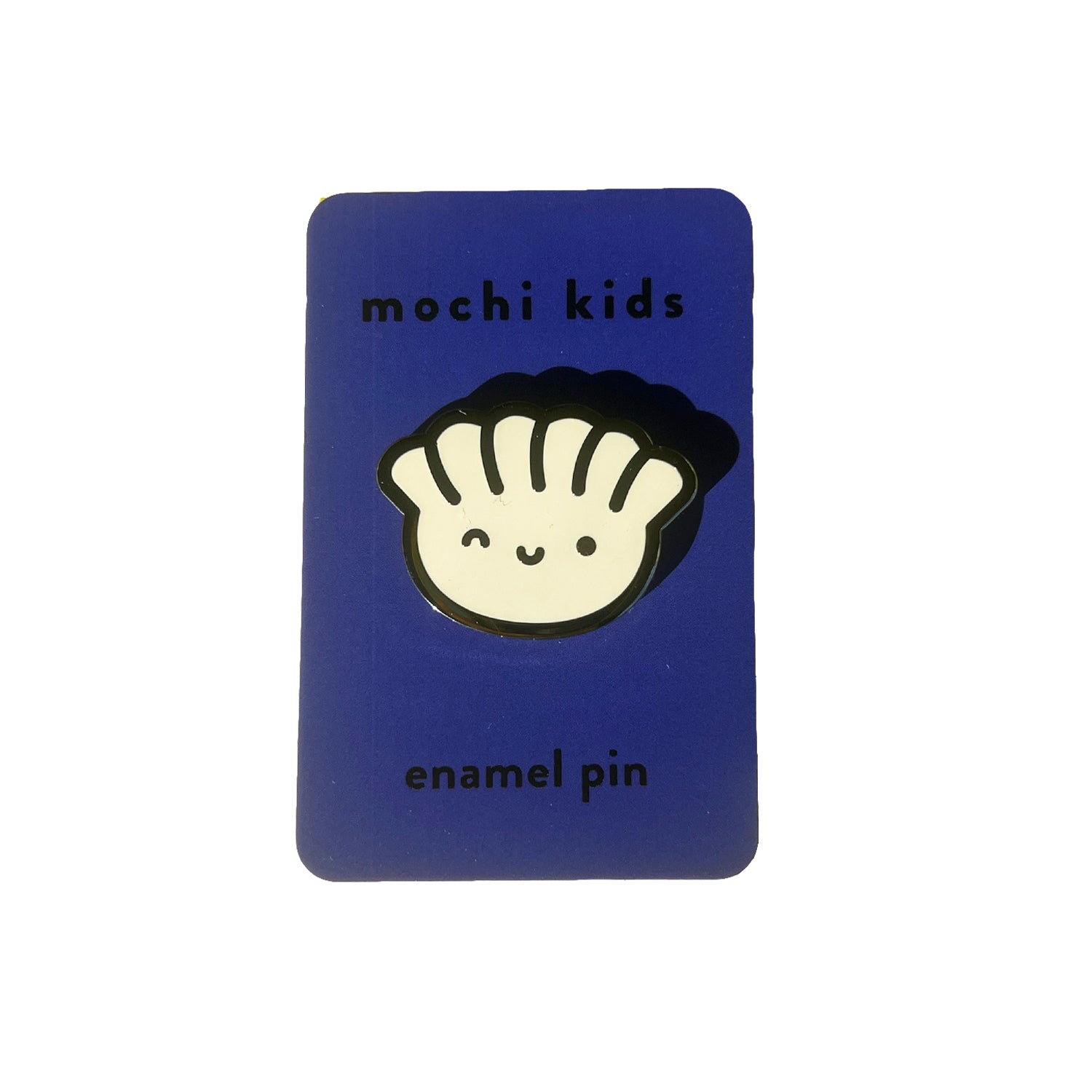 A blue rectangular card with the text 'mochi kids enamel pin' and a hard enamel pin featuring a stylized design of a gyoza (dumpling) with a smiling face.