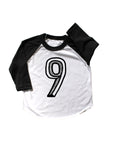 Baseball tee white with black sleeves screen printed with black number 9.