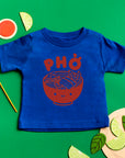 Blue tee screen printed with red ink text Pho above a smiling bowl of Pho.