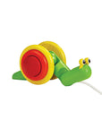 Colorful wooden pull-along snail toy on a white background