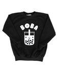 Black sweatshirt with screen printed white ink text BOBA above a smiling glass of boba.