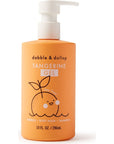 Orange bottle of tangerine shower gel.