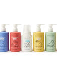 A rainbow array of bottles of shower gel bottles.