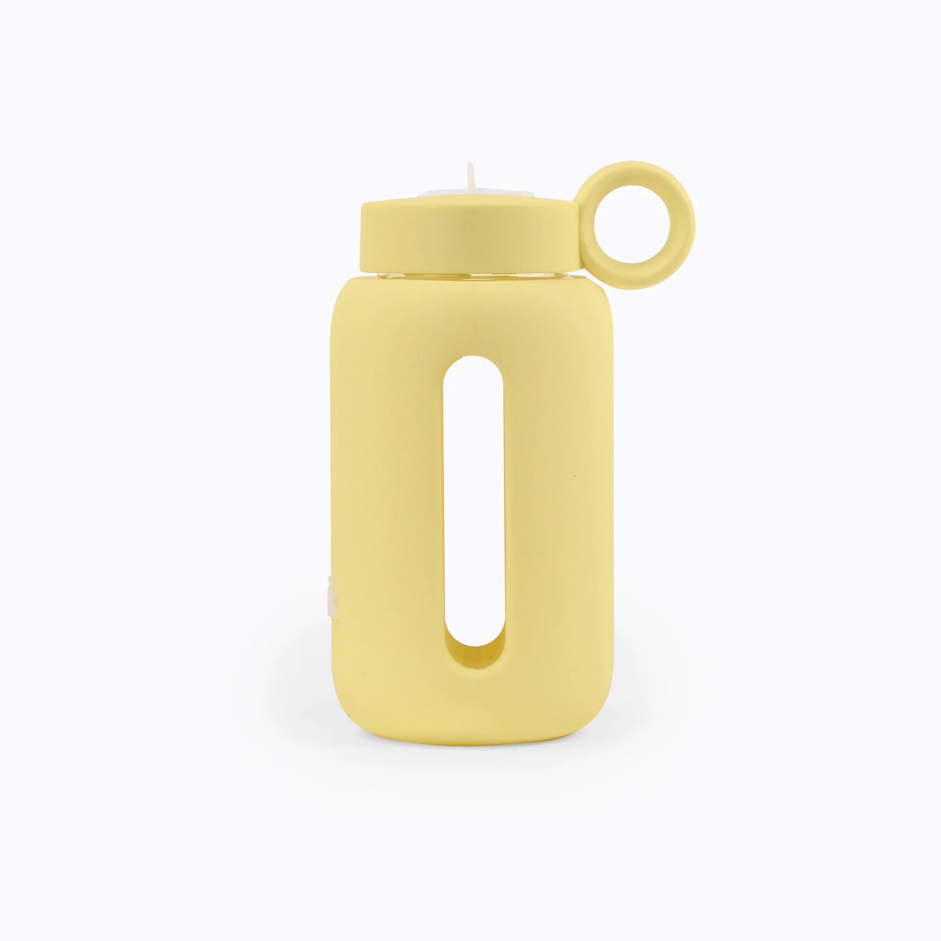 Glass water bottle with a protective silicone sleeve and screw on cap in yellow.