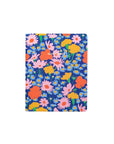 Floral-patterned notebook on a gray background