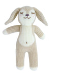 Knitted toy deer on a white background