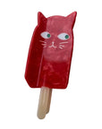 Red popsicle shaped like a cat on a white background