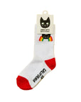 White sock with red toes and soles, featuring a rainbow and cat design, on a yellow background.
