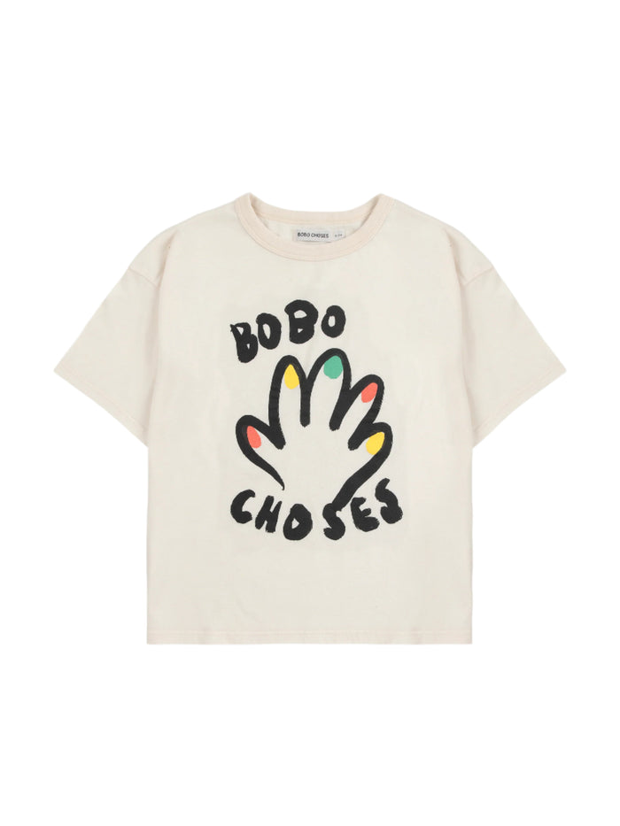 Beige t-shirt with colorful handprint design and 'BOBO CHOSES' text on a white background.