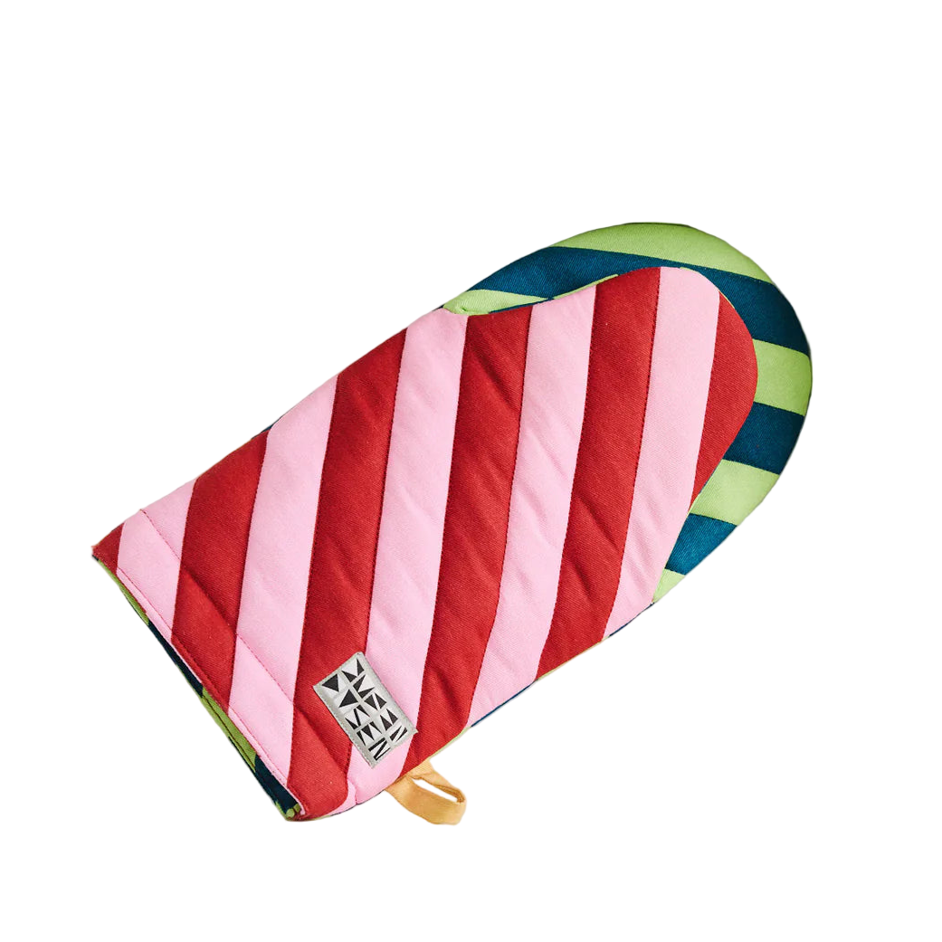 A vibrant oven mitt with red and pink diagonal stripes
