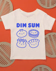 White tee with screen printed with blue ink text DIM SUM and four smiling Dim Sum dumplings.