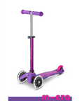 A purple and pink three wheeled push scooter with the front two wheels lit up with LED lights.