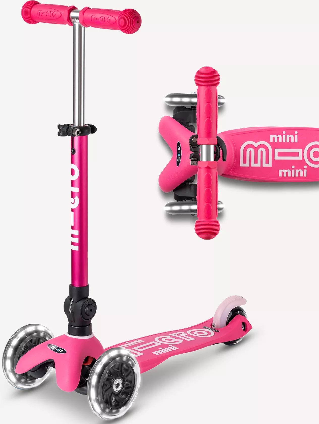 A pink and white three wheeled push scooter with the front two wheels lit up with LED lights.