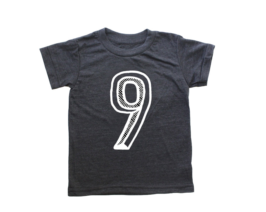 Black tee screen printed with white number 9.