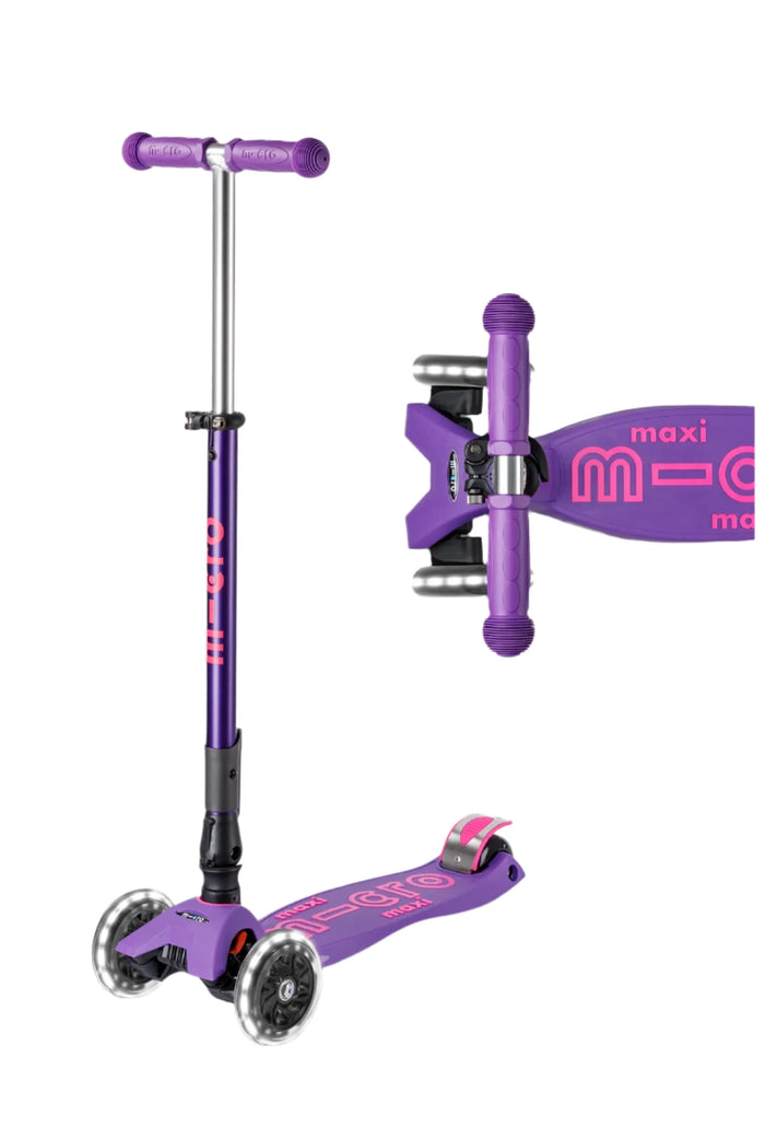 Purple and pink three wheeled scooter with telescoping handlebars with light up wheels. 