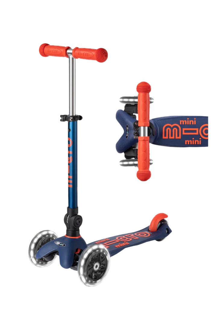 Navy and red foldable  three wheeled scooter with telescoping handlebars with light up wheels.