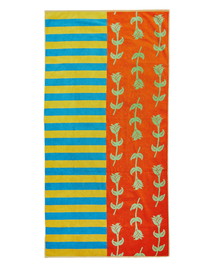 Beach towel blue and yellow stripe and orange with green roses.