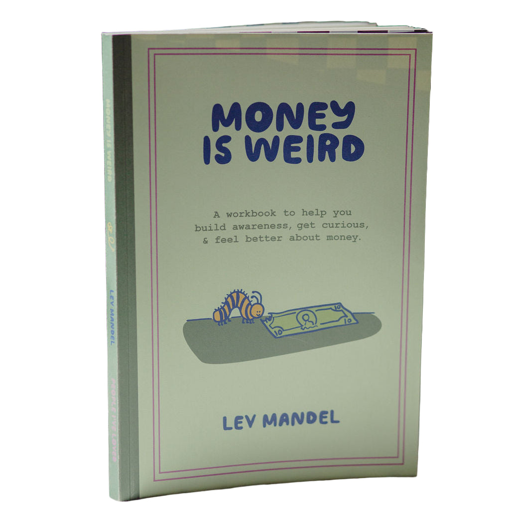 Book titled 'Money is Weird' by Lev Mandel on a polka dot surface with a blurred background