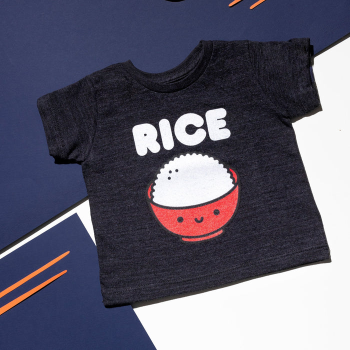 Black tee screen printed with white ink text RICE above a red smiling bowl full of white rice.