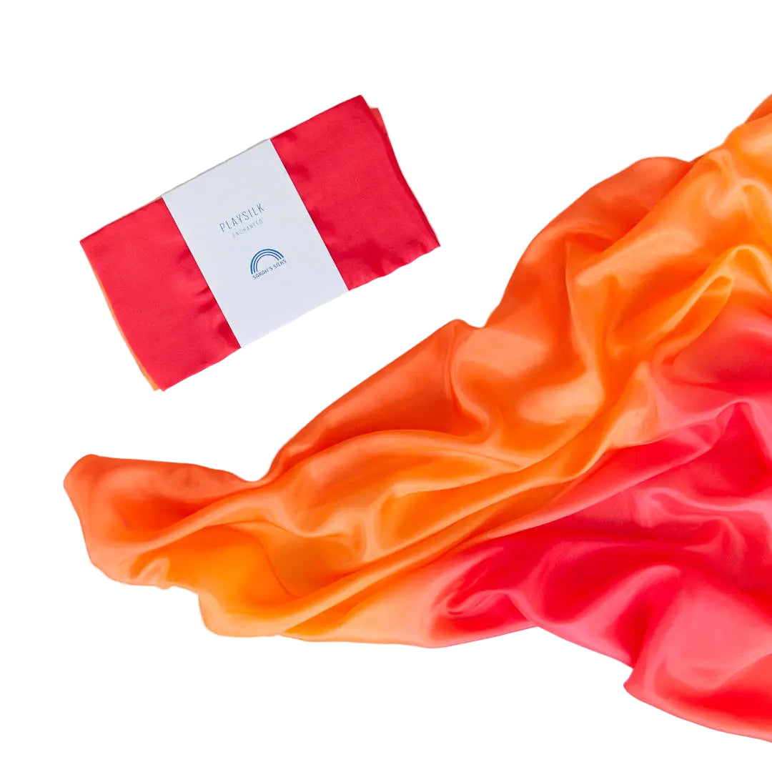 Red satin fabric with a visible brand label on a white background