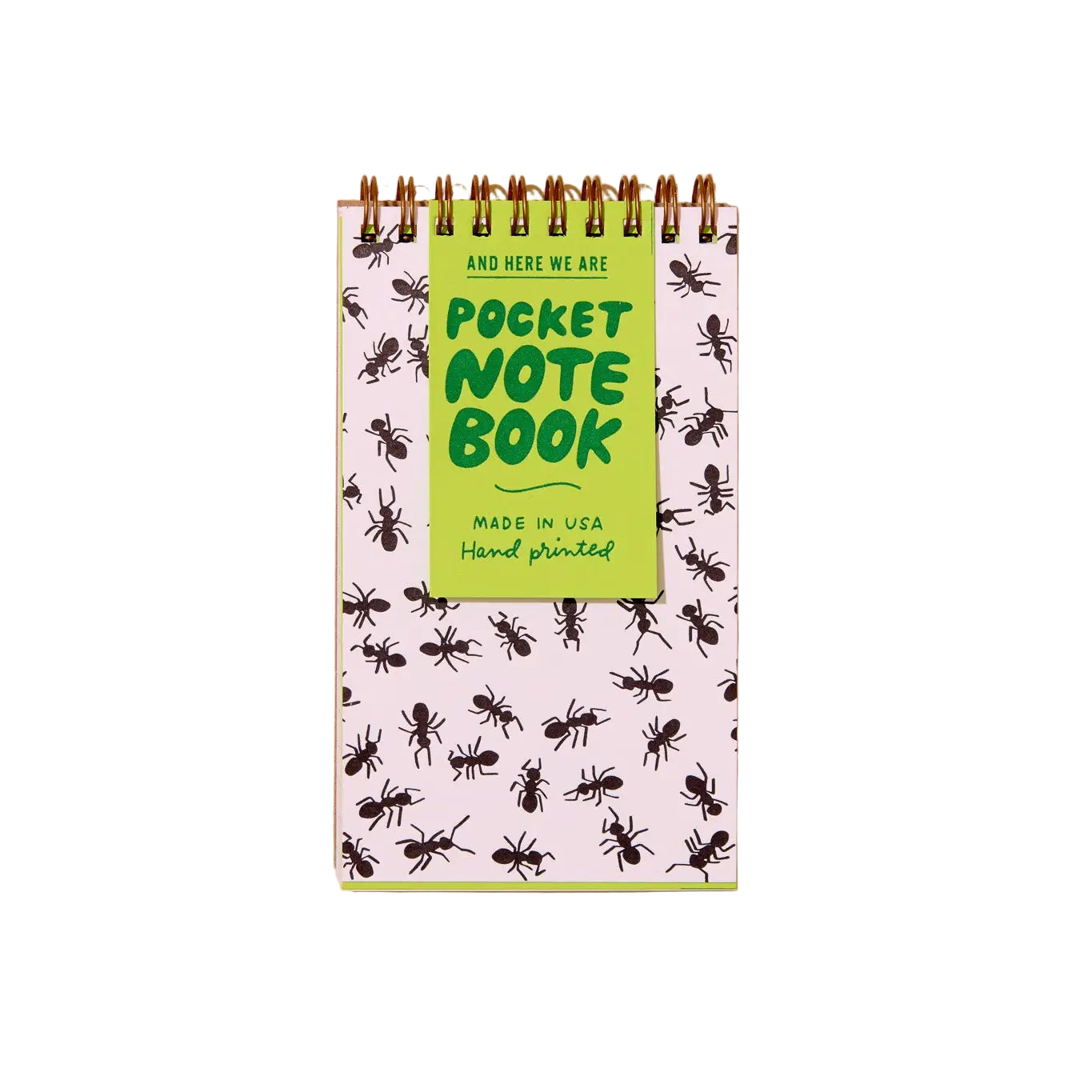 Pocket notebook with ant pattern and green label on a beige background