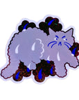 Sticker of a cartoon cat with blue tears on a yellow background
