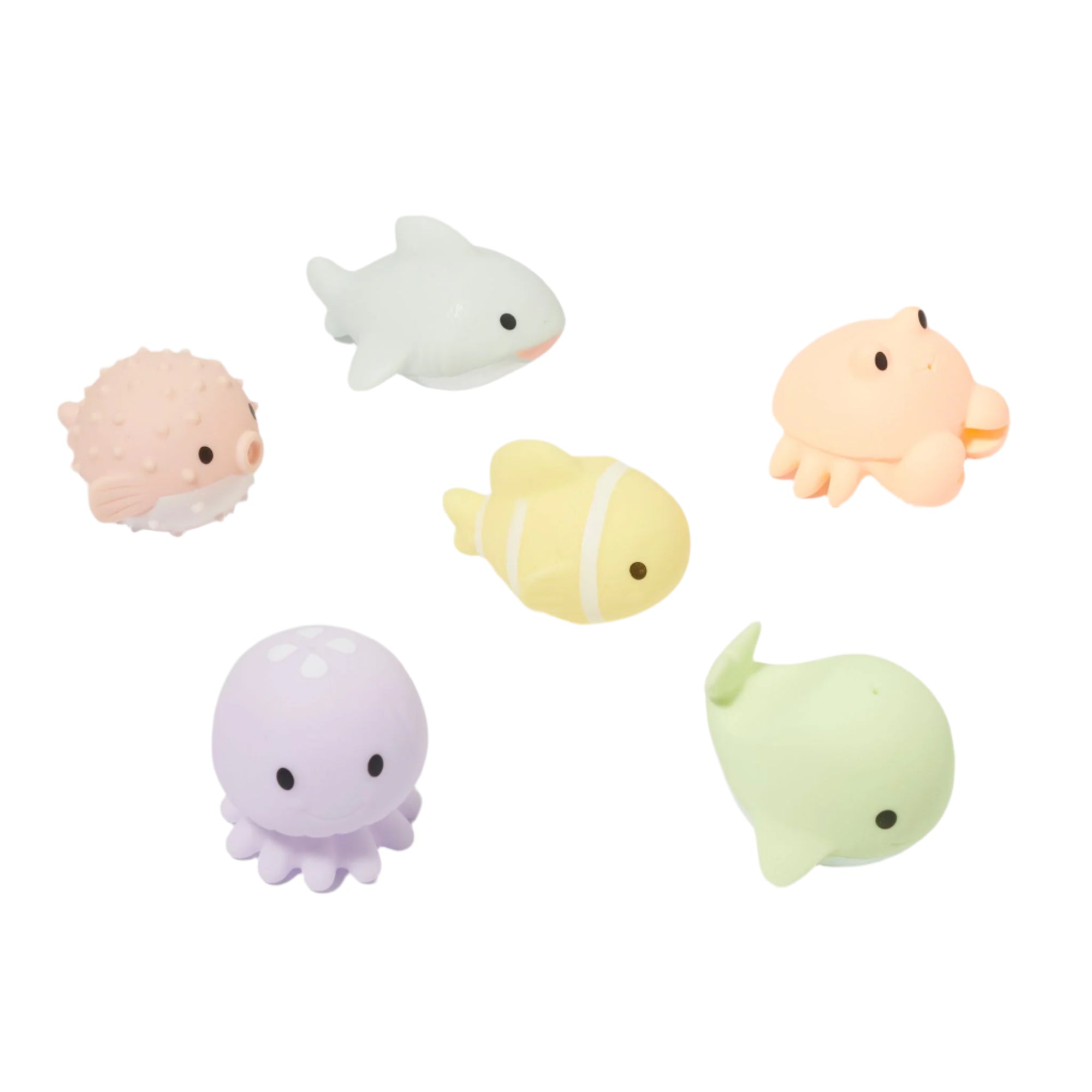 Pastel colored bath toys shaped like animals of the ocean Clown Fish Shark Crab Whale Octopus and Puffer Fish.