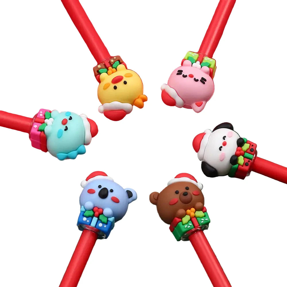 Colorful christmas characters on top of red pens. 