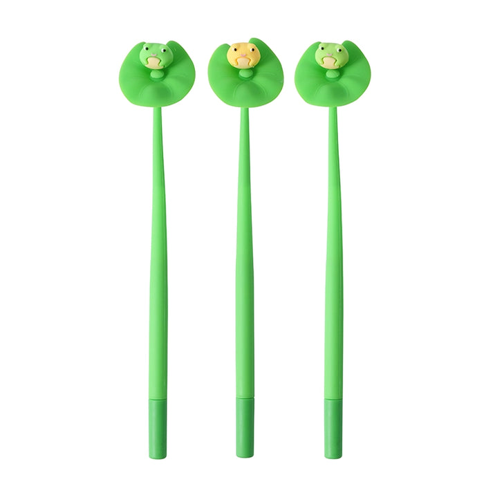 Three green pens with frogs sitting on a lily pad. Green frog, light yellow frog, light green frog. 