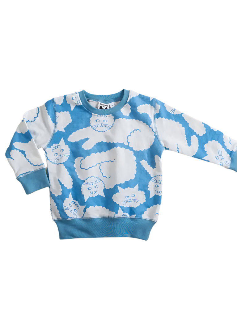 Blue sweater with white cat cloud pattern on a white background