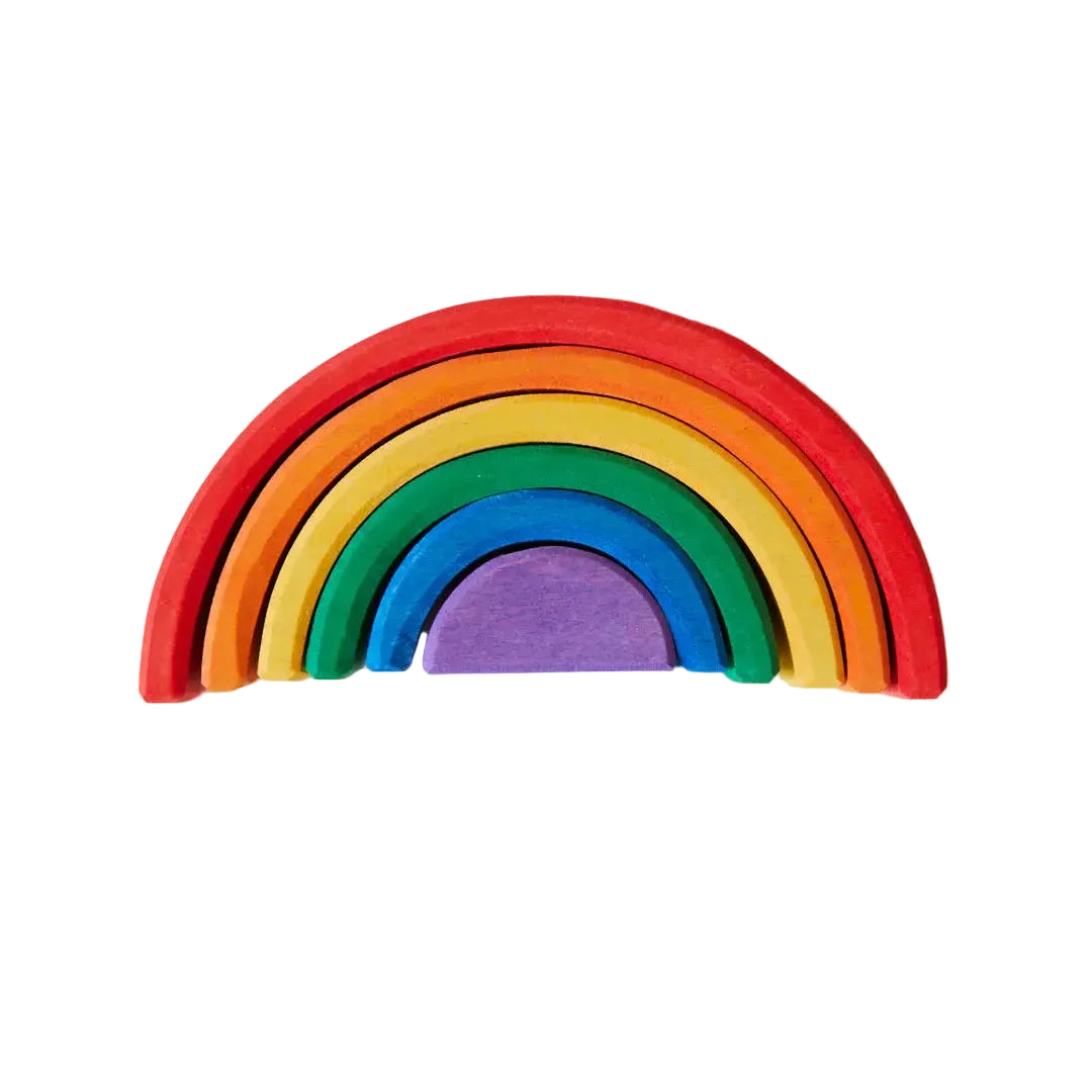 Colorful wooden rainbow toy on a light background