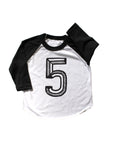 Baseball tee white with black sleeves screen printed with black number 5.