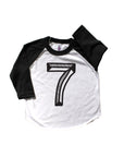 Baseball tee white with black sleeves screen printed with black number 7.