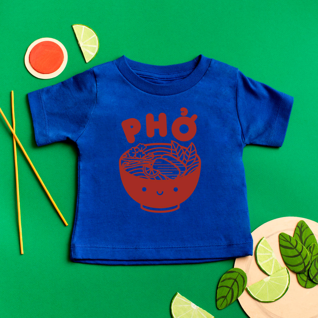 Blue tee screen printed with red ink text Pho above a smiling bowl of Pho.